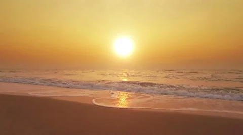 Overlooking the beautiful beach at sunset. Stock Footage 62655522