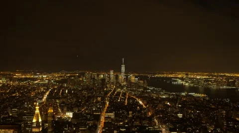 Overlooking city metropolis at night. illuminated urban streets lights. new york Stock Footage