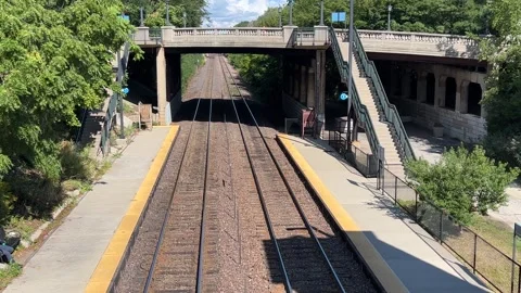 Overlooking the Commuter Train Platform Stock Footage 250276639