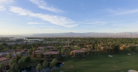 Overlooking desert and golf community Stock Footage 76451705