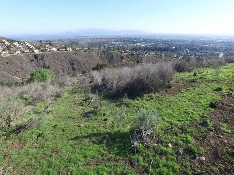 Overlooking distant city from hill Stock Footage 71480811