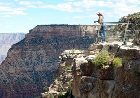 Overlooking the Grand Canyon on Ciff Stock Photos