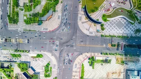 Overlooking intersections and overpasses, traffic shuttles. Stock Footage 313868117
