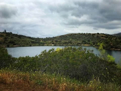 Overlooking A Lake On A Cloudy Day Stock Photos