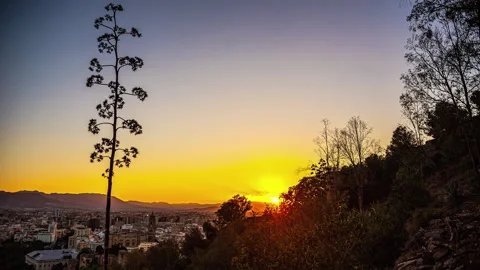 Overlooking Malaga, Spain at sunset - time lapse Stock Footage 252065829
