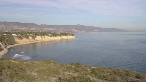 Overlooking ocean from a cliff, 4k Stock Footage 103436571