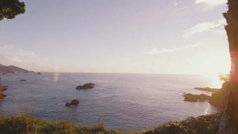 Overlooking Pacific Ocean at sunset on the beautiful Oregon coast cliff beach Video stock 148344318