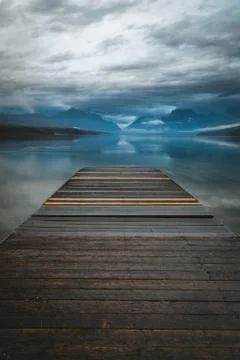 Overlooking a reflective lake. Stock Photos