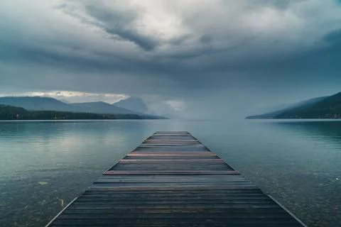 Overlooking a reflective lake. Stock Photos