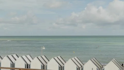 Overlooking the rows of beach huts at Yport Stock Footage 285237529