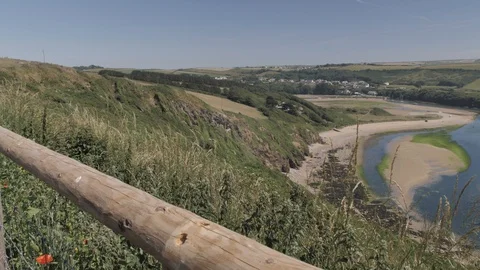 Overlooking the Sandy Estuary the River Snakes out to Sea Vídeo Stock 120255023