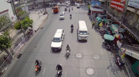 Overlooking shot of typical traffic on an urban street in Bangkok, with sound 스톡 동영상 67145093