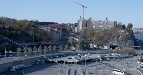 Overlooking Sodermalm parking lot and road from hill Stock Footage