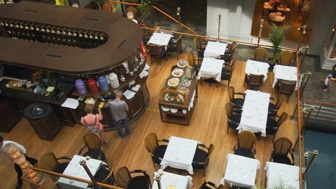 Overlooking view of a restaurant inside the Shoppes at Marina Bay Sands. Stock Footage 82224309