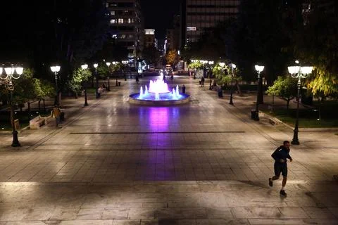 Overnight curfew came into effect in Greece to curb spread of Covid-19, Athens - Stock Photos