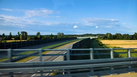 Overpass between green fields and forest Stock Footage 127368280
