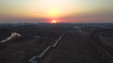Overpass bridge over landscape field sunset Video stock 227408344