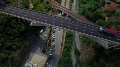 Overpass bridge road of multi level interchange junction in a small coastal city Stock Footage 67547908