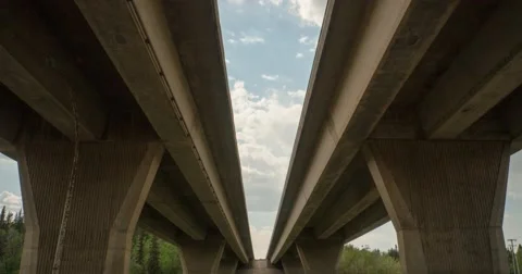Overpass of freeway seen from below in a motion timelapse. Stock Footage 50447931