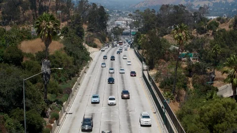 From overpass overlooking freeway north of los angeles 스톡 동영상 112763108