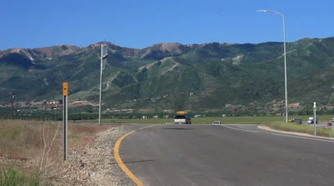 Oversize Load on. aSemi Truck Going down a Mountain Highway.  Video stock 24846693