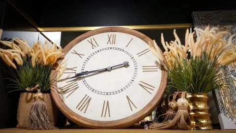 Oversized clock in home high up on wall Stock Photos