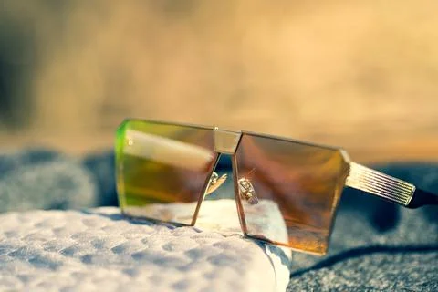 Oversized sunglasses model with big flat lenses shoot outside in a sunny day Stock Photos