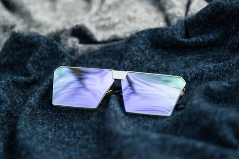 Oversized sunglasses model with pink flat lenses shoot outside in a sunny day Stock Photos