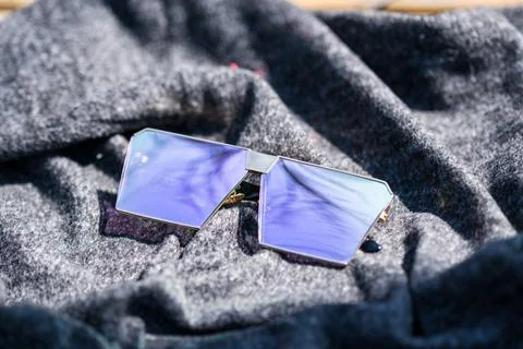 Oversized sunglasses model with pink flat lenses shoot outside in a sunny day Stock Photos