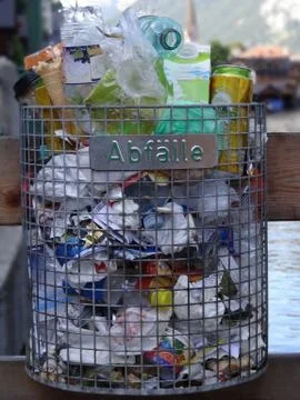 Overstuffed trashcan Stock Photos