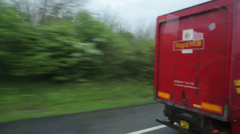 Overtaking royal mail lorry driving on motorway in england Stock Footage 37865185