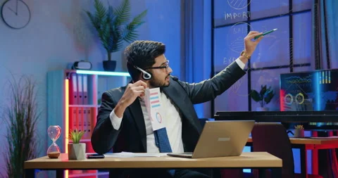Overtime work in office where handsome confident responsible experienced bearded Stock Footage 166628542