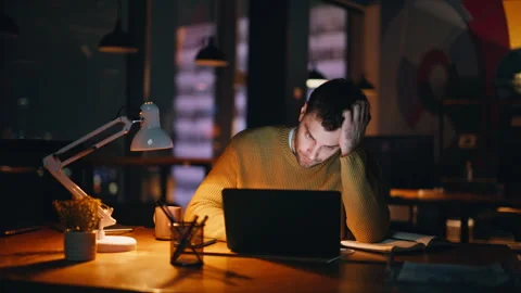 Overtime worker watching laptop looking solutions issues in dark office closeup. Stock Footage 340168708