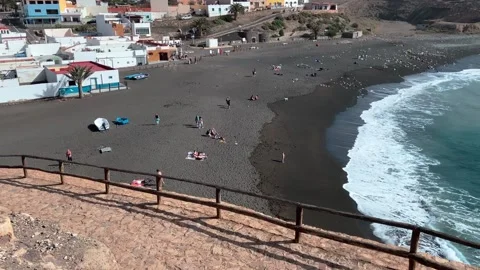 Overview of Ajuy black sandy beach from the coast path Stock Footage 239928235