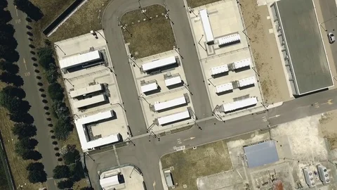 Overview of an architectural structure of a power plant. Aerial video. Stock Footage 70391594