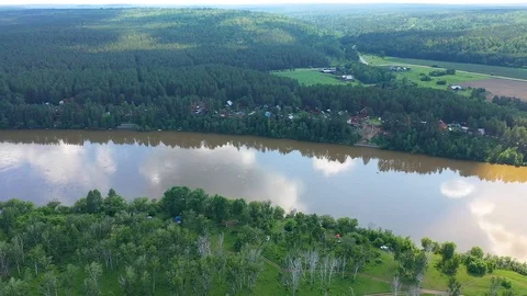 Overview of the beautiful summer landscape. UAV flight over the river and the Video stock 112936003