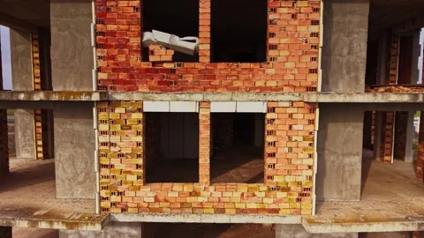 Overview of a building under construction in a rural area Stock Footage 324521334