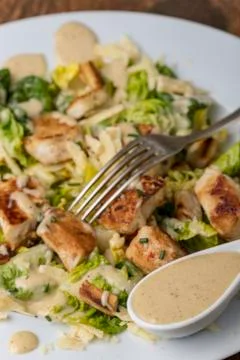 Overview of a caesar salad on a plate Stock Photos