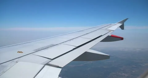 Overview clouds and sky from indoor plane Stock Footage 155820452