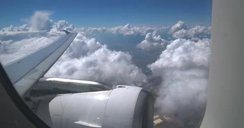 Overview clouds and sky from indoor plane Stock Footage 155820459