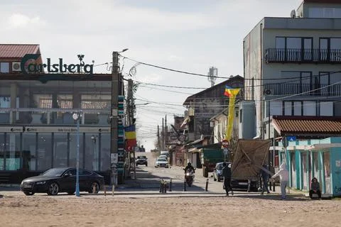 Overview of the empty Vama Veche beach and some pubs and restaurants on a s.. Stock Photos