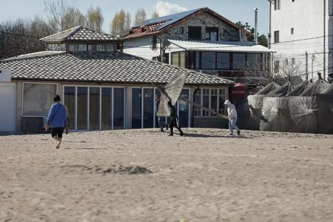 Overview of the empty Vama Veche beach and some pubs and restaurants on a s.. Stock Photos