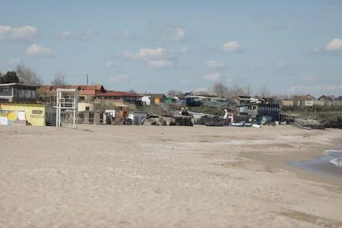 Overview of the empty Vama Veche beach and some pubs and restaurants on a s.. Stock Photos