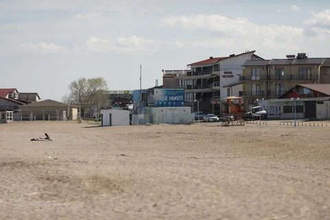 Overview of the empty Vama Veche beach and some pubs and restaurants on a s.. Stock Photos