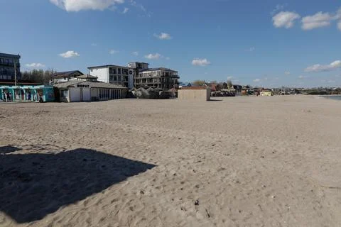 Overview of the empty Vama Veche beach and some pubs and restaurants on a s.. Stock Photos