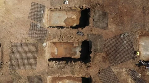 Overview of Foundation Construction Work with Machinery and Rural Surroundings. Stock Footage 339095597