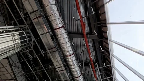 Overview of Industrial architecture under construction with mechanical vents. Stock Footage 319641883