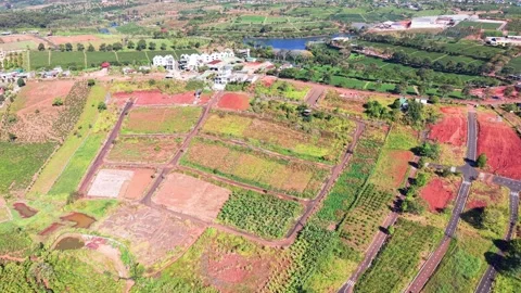 An overview of land development in Lam Dong, Vietnam. Different areas are being Stock-Footage 331052400