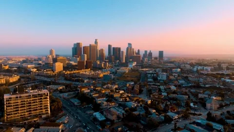 Overview of Los Angeles skyline during sunset with urban traffic patterns Stock Footage 336489302