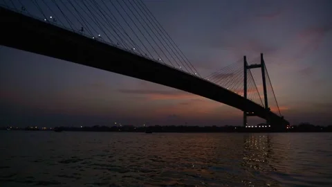 Overview of the modern Vidyasagar Setu bridge in Kolkata, India after sunset. Stock Footage 261034789